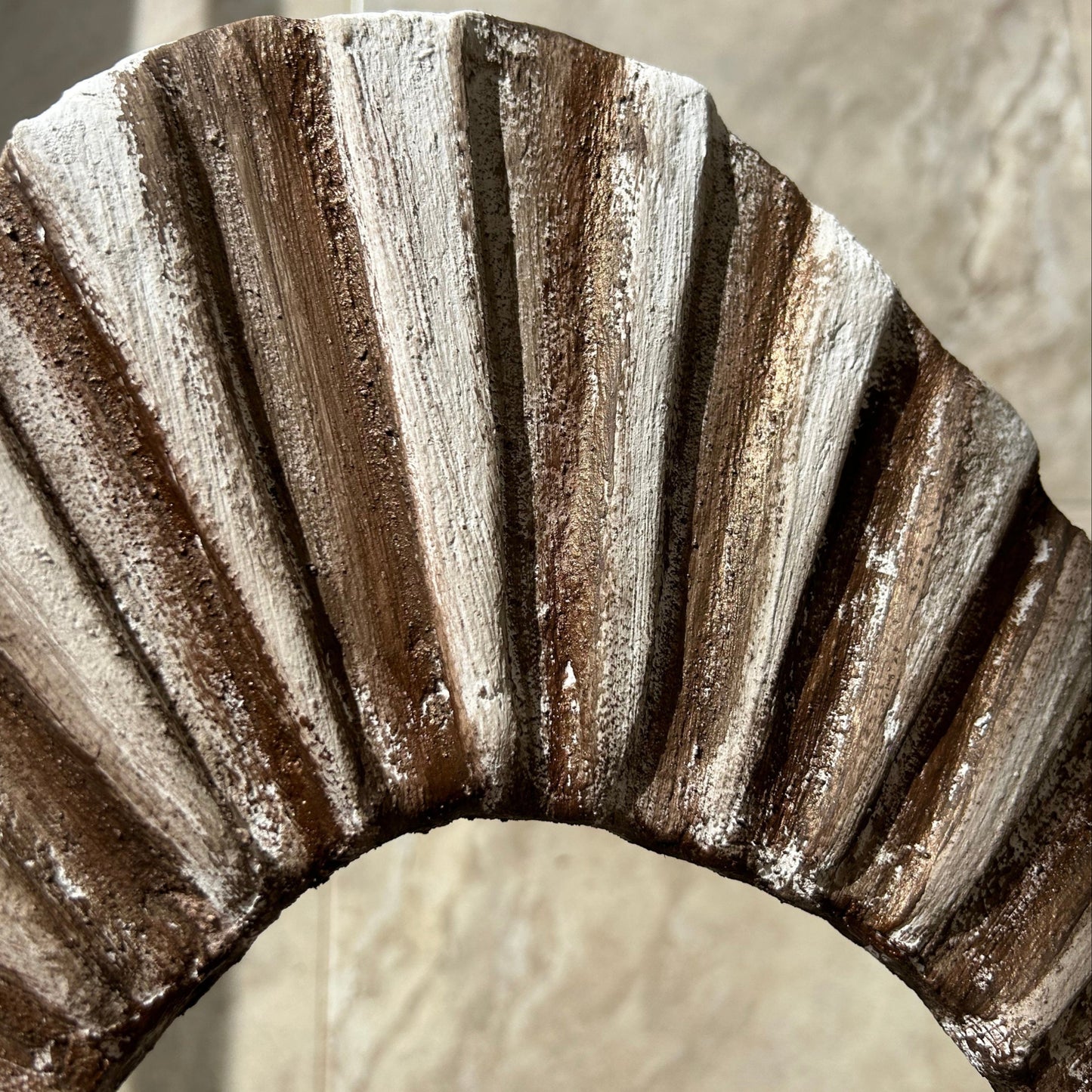 Angled view showing depth and organic surface of the 3D wall art piece
