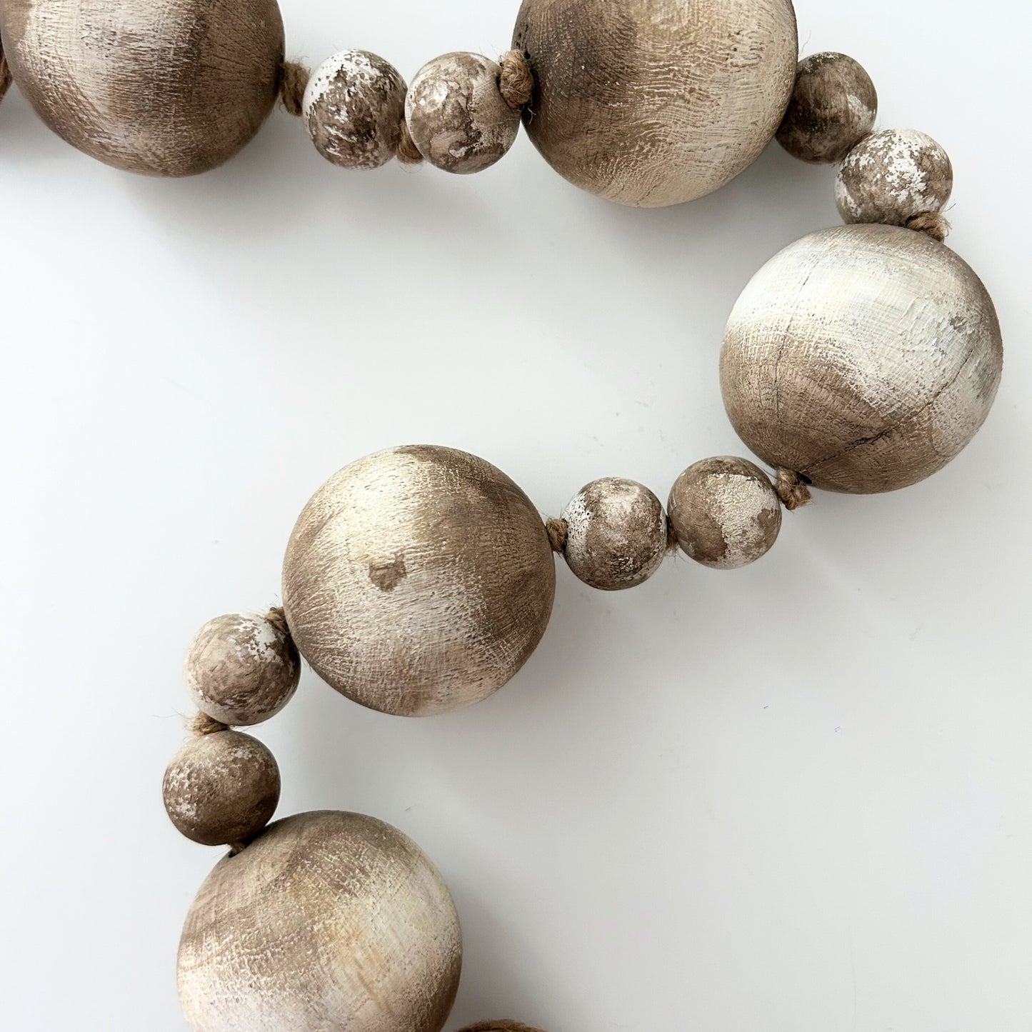 Close-up of oversized natural wood beads for rustic home decor