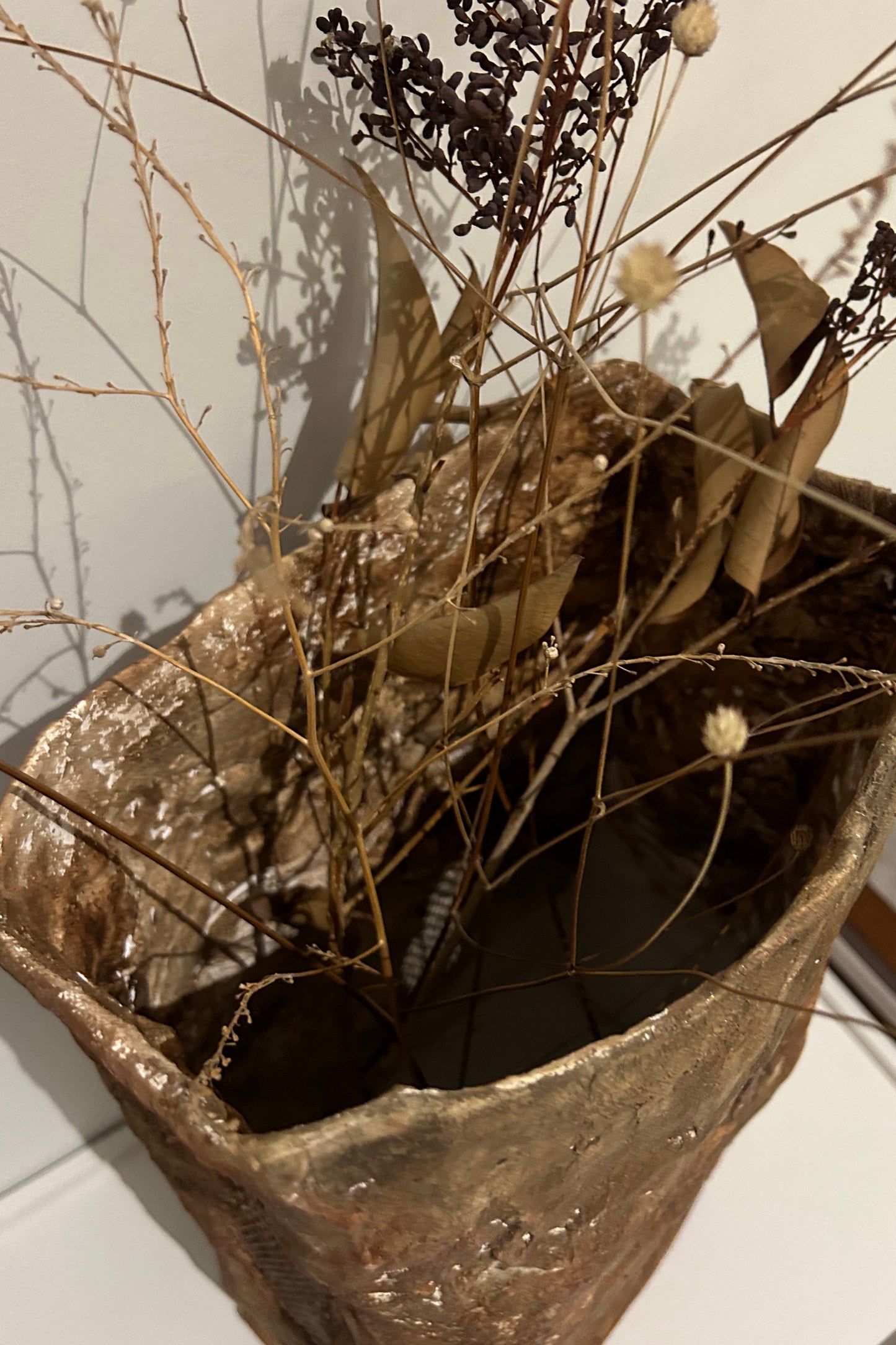 Top-down view showing wide mouth of organic textured vase