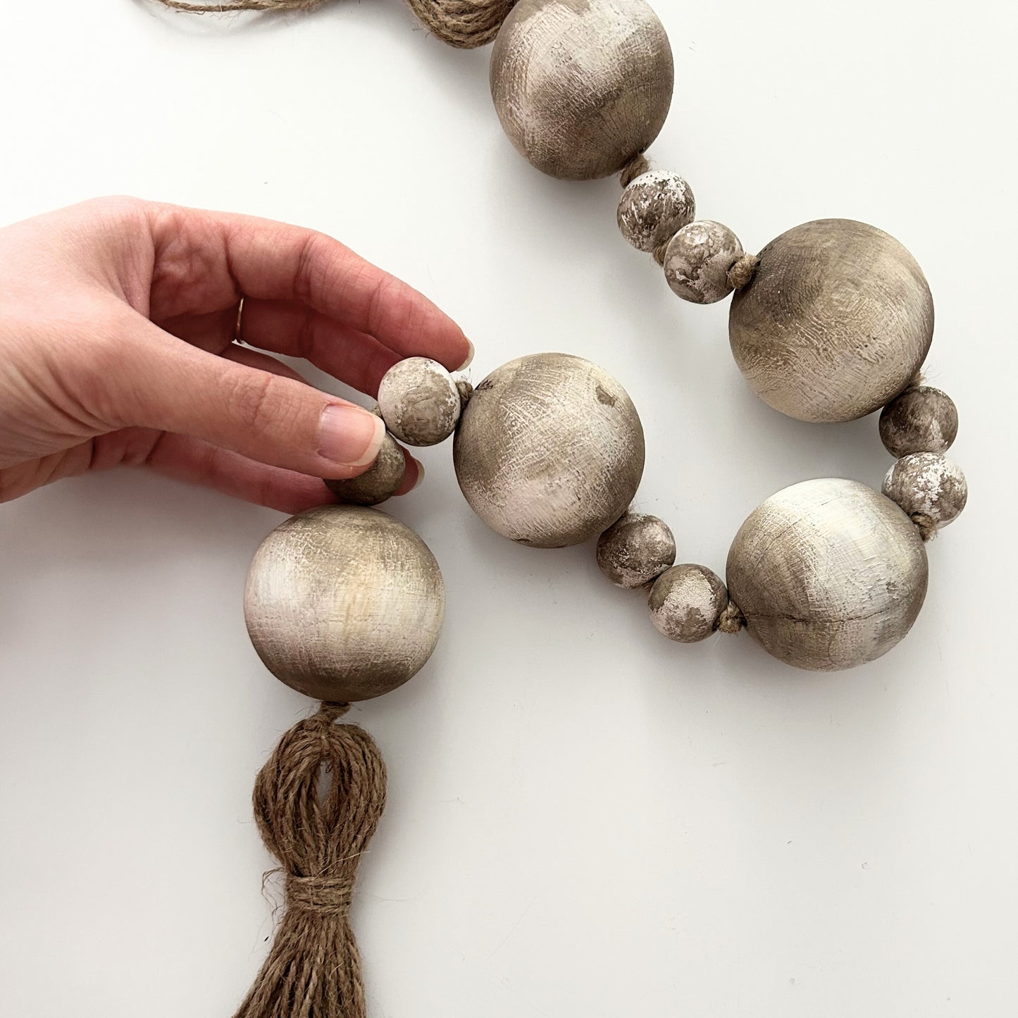 Handcrafted boho bead garland with visible handmade texture