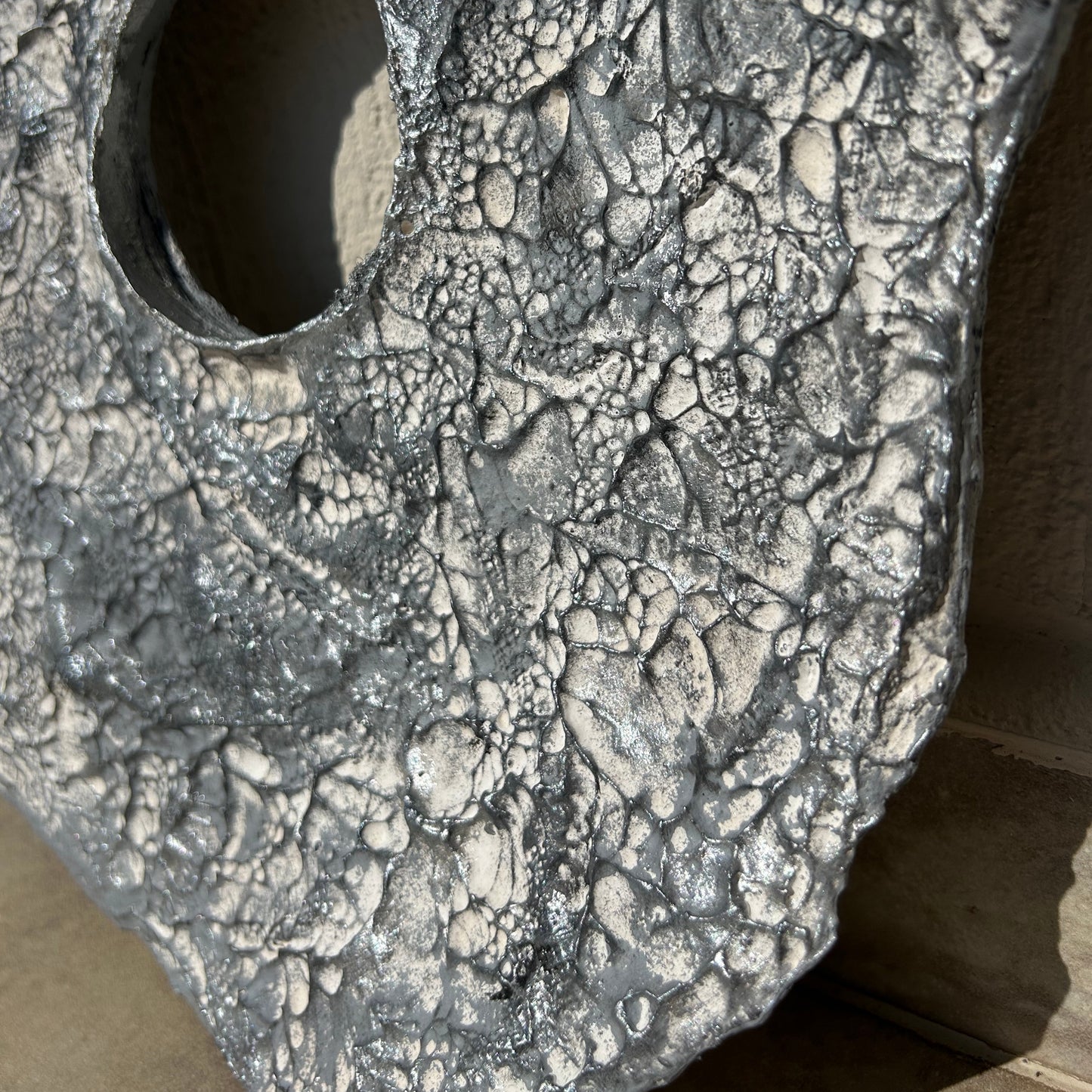 Textured plaster wall decor with natural grooves and silver finish, handmade