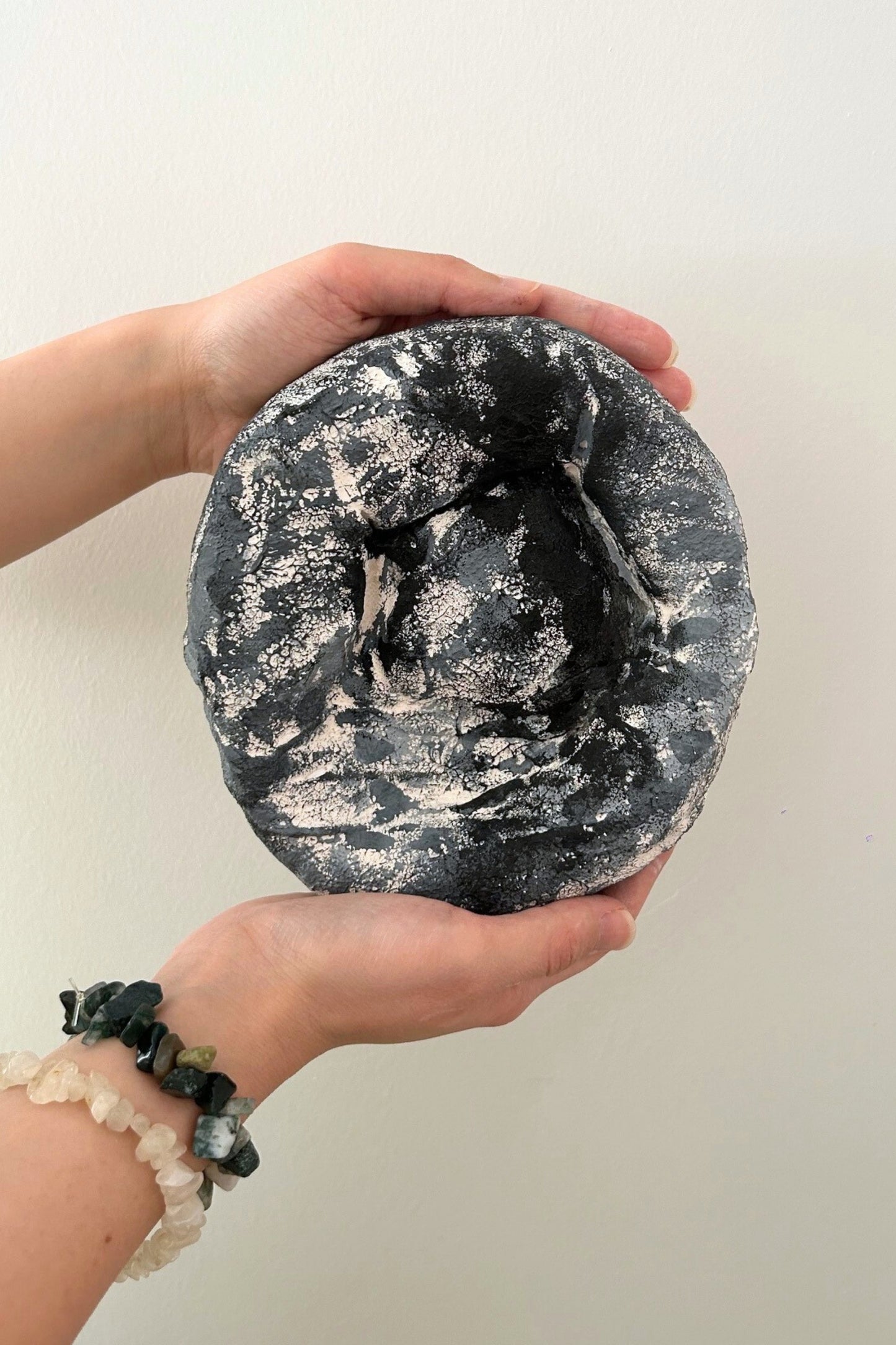 Small handcrafted wabi sabi style wall decor in grey matte finish
