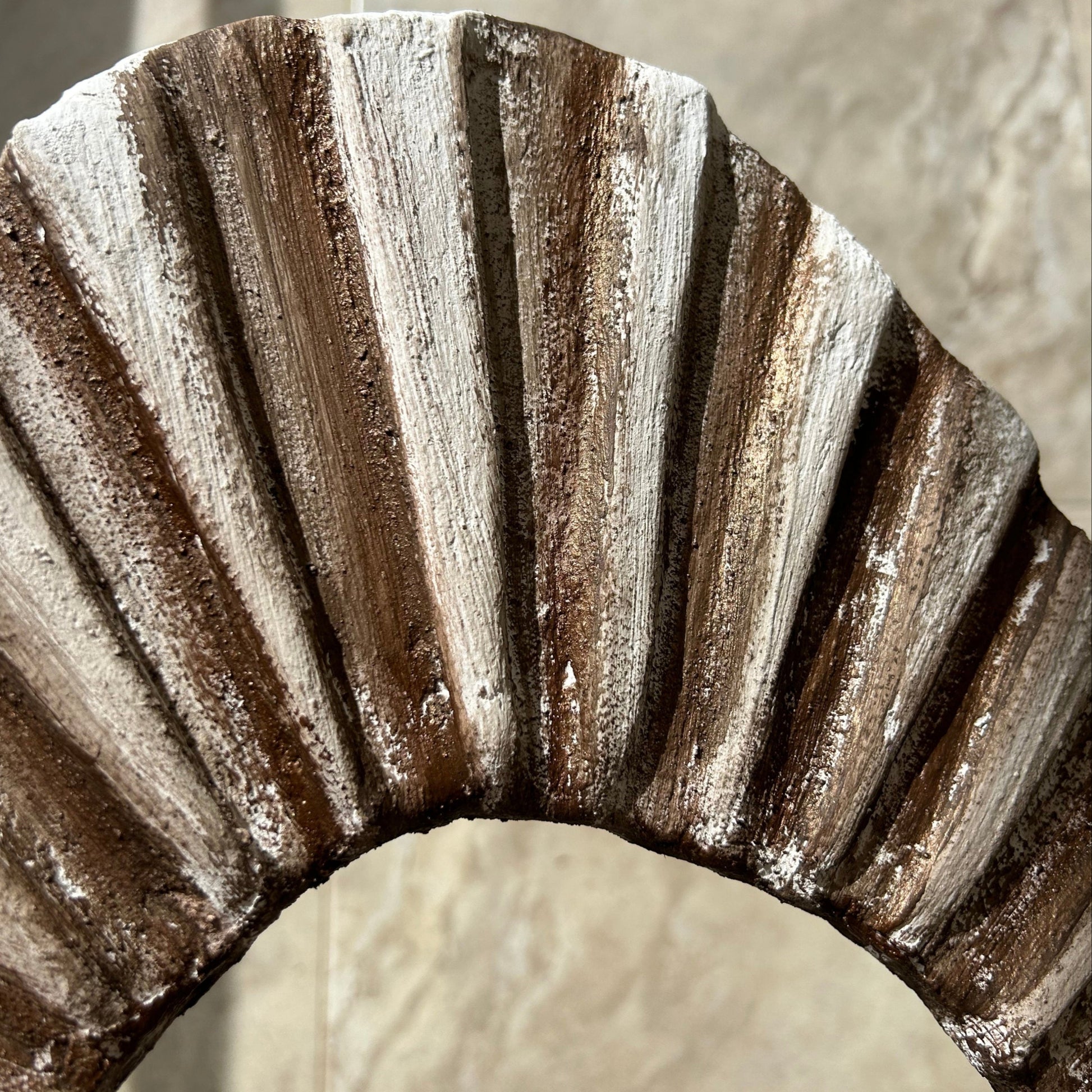 Angled view showing depth and organic surface of the 3D wall art piece
