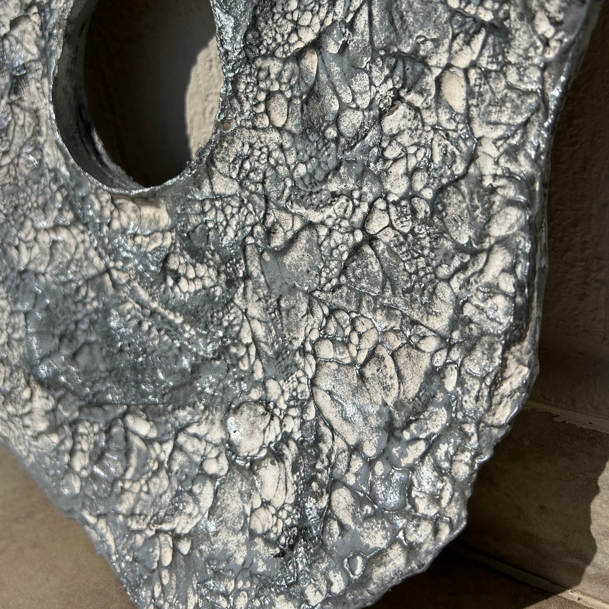 Textured plaster wall decor with natural grooves and silver finish, handmade